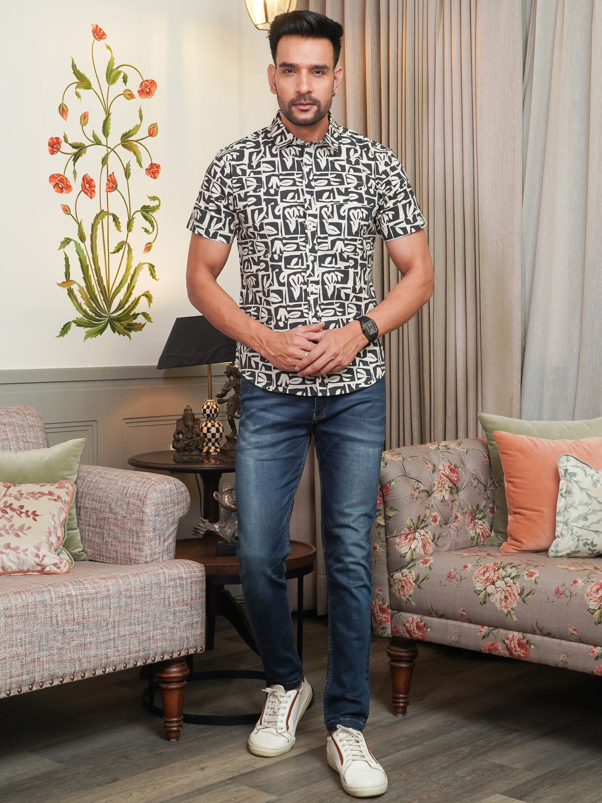 Front view of men’s black geometric printed cotton shirt