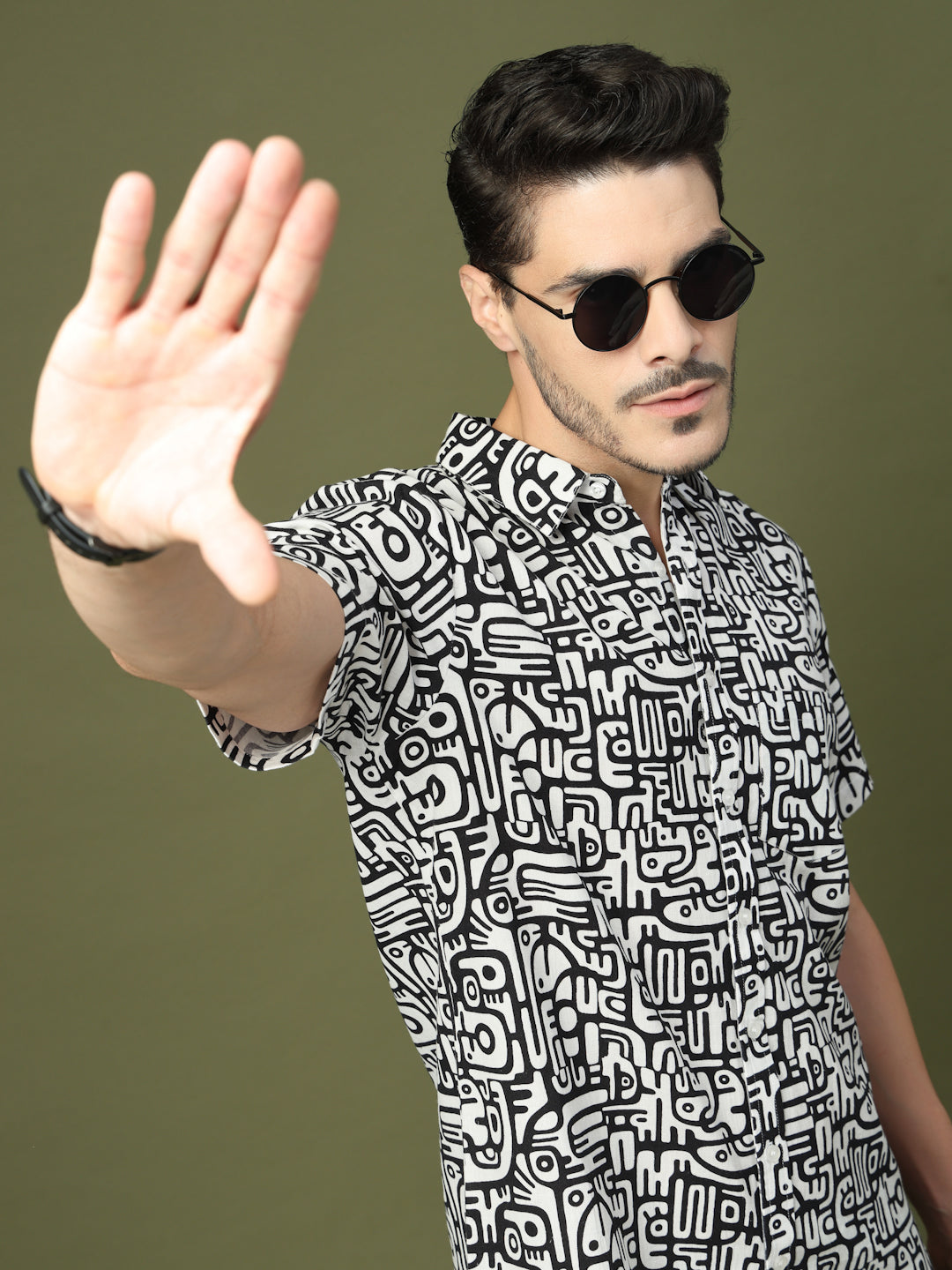 Front view of men’s black and white typography printed shirt