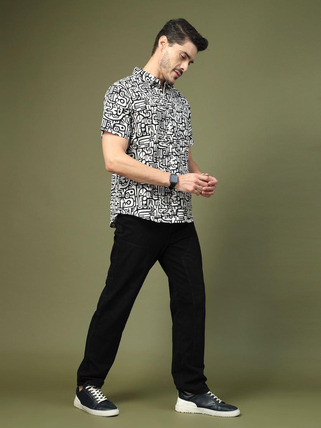 Front view of men’s black and white typography printed shirt