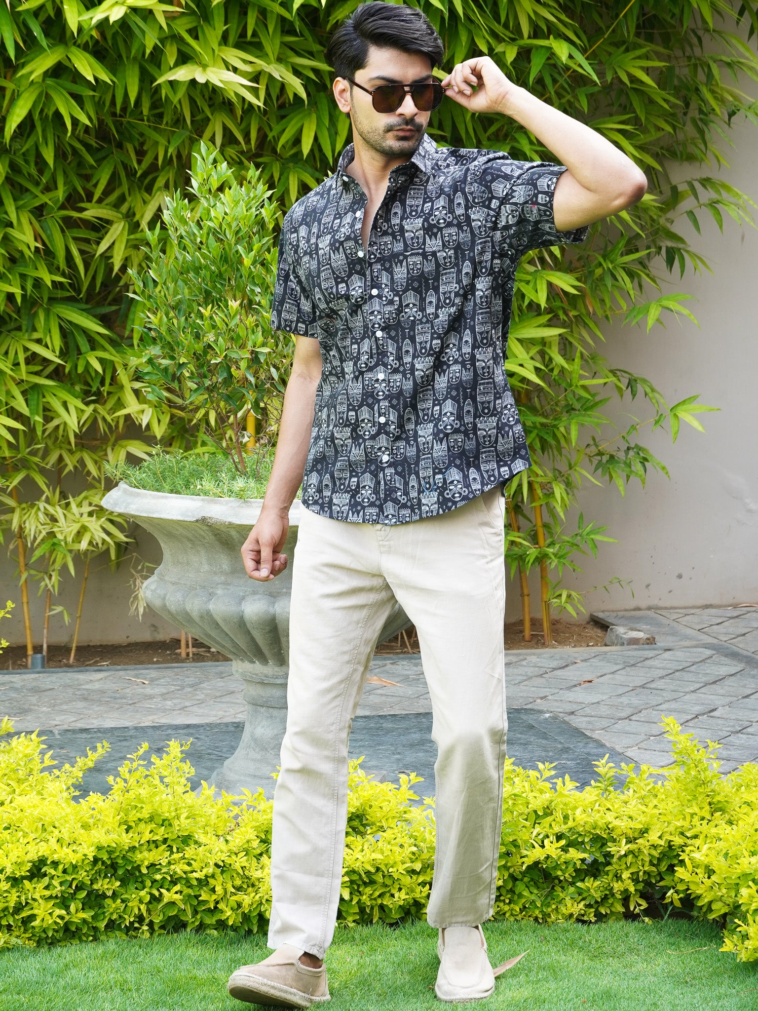 Side view of black tribal printed half sleeve shirt for men
