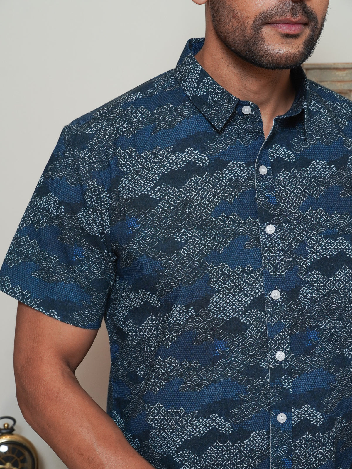 Close-up of blue grey cloud-like and geometric abstract motifs