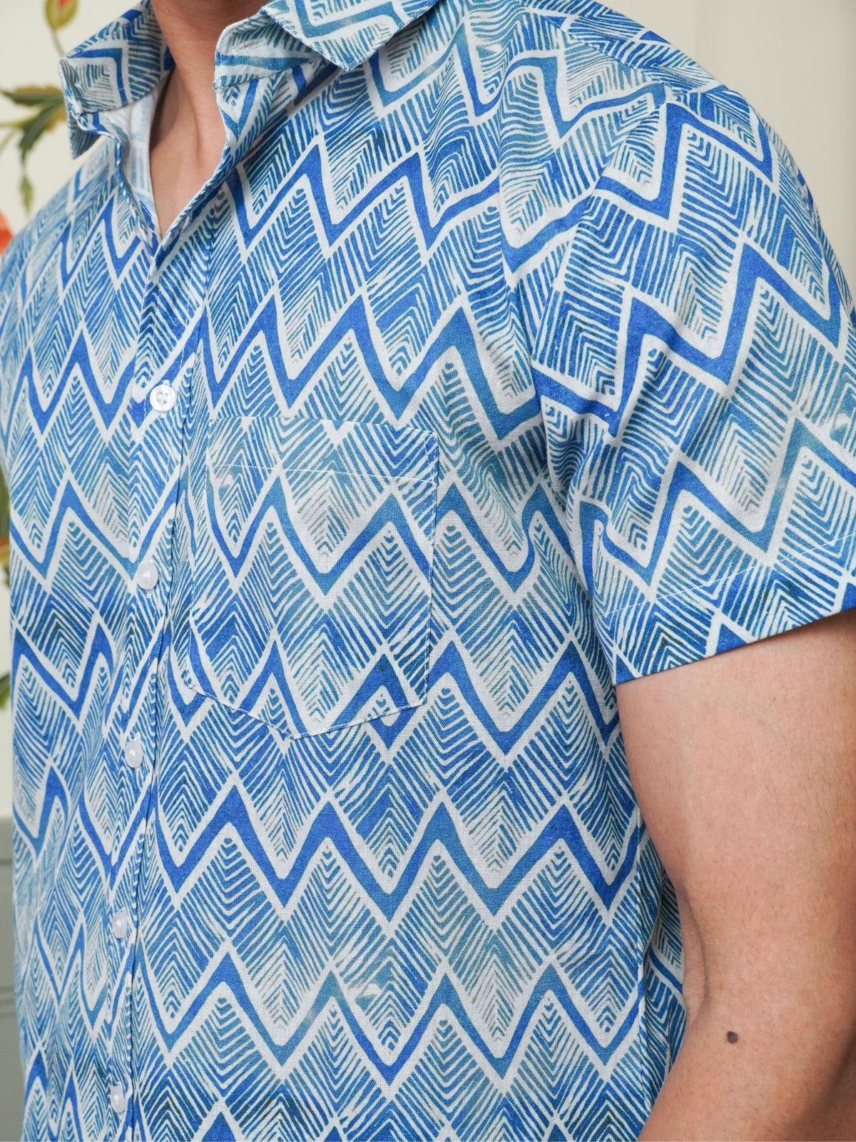 Close-up of layered blue zigzag and geometric lines