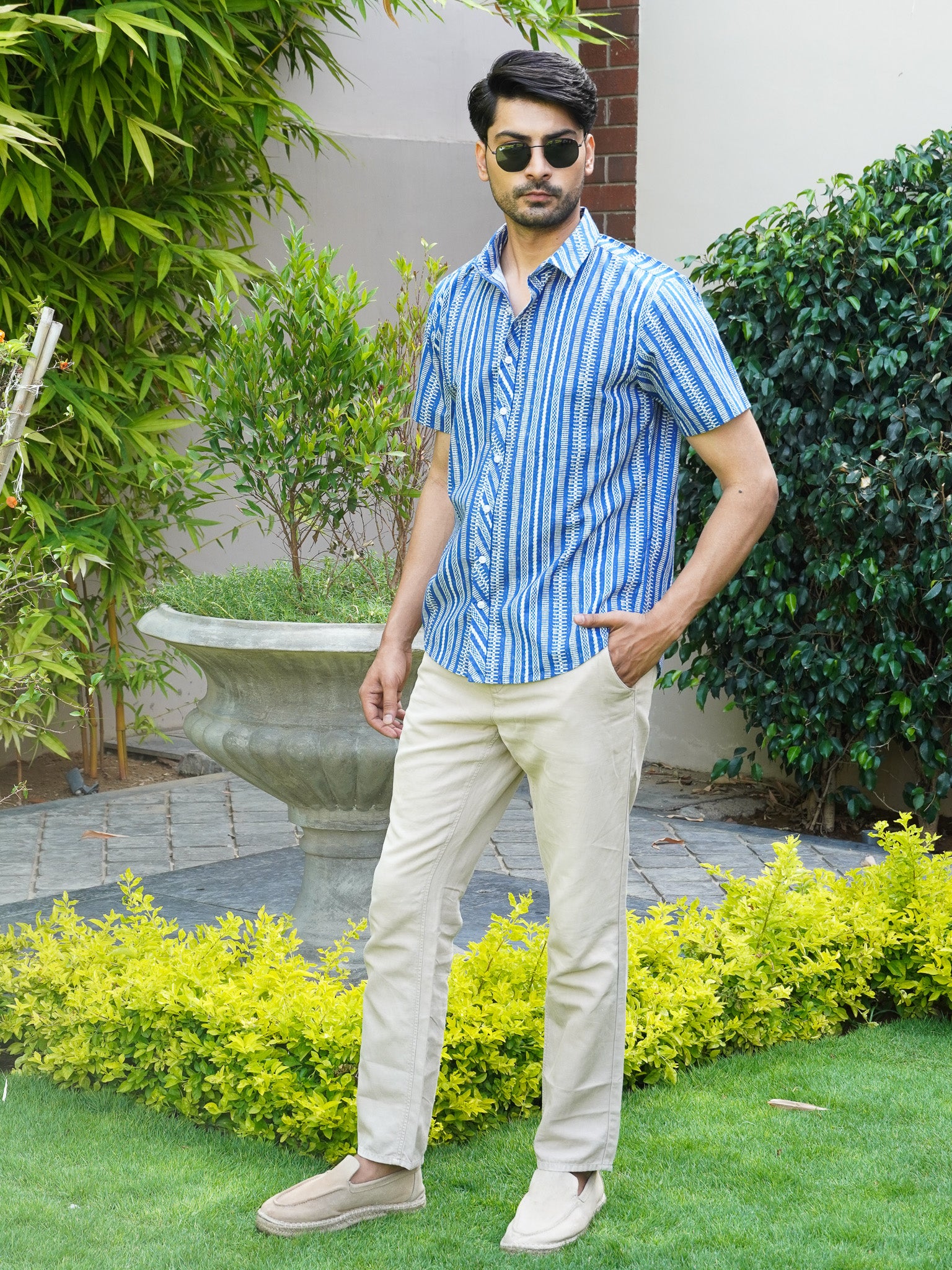 Side view of men’s blue abstract striped cotton shirt