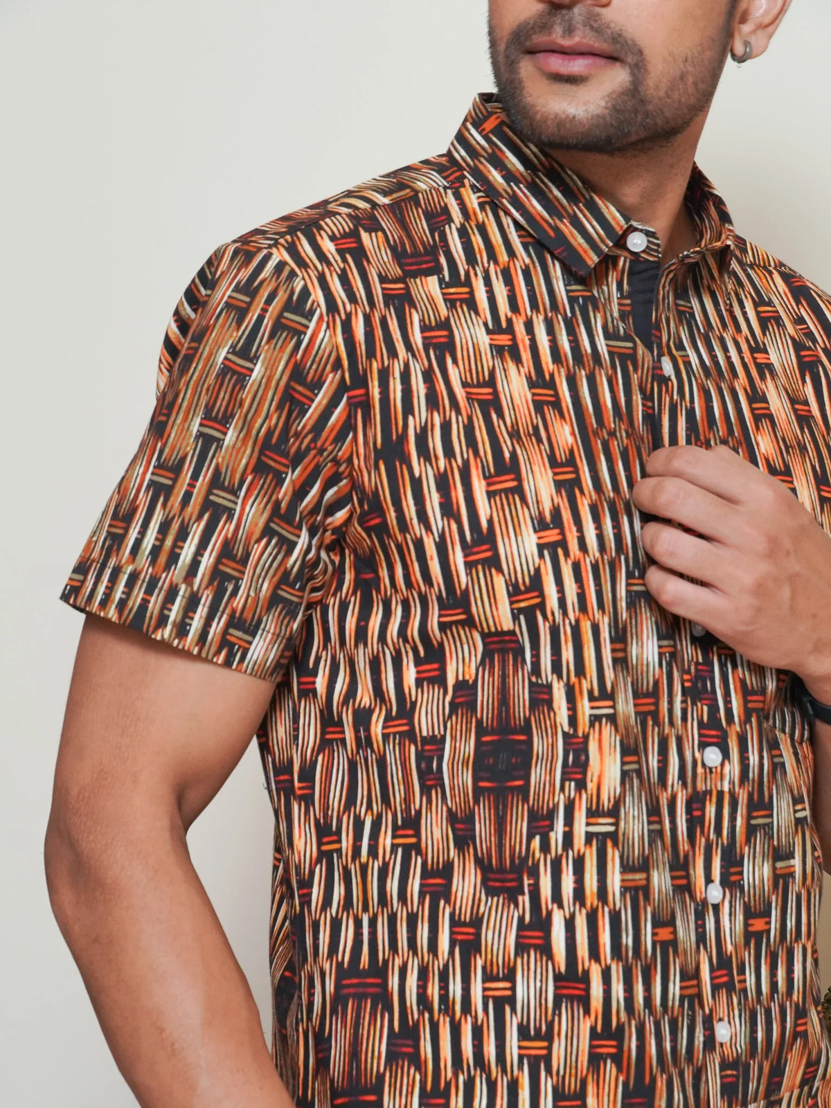Close-up of brown tan cream and rust geometric motifs