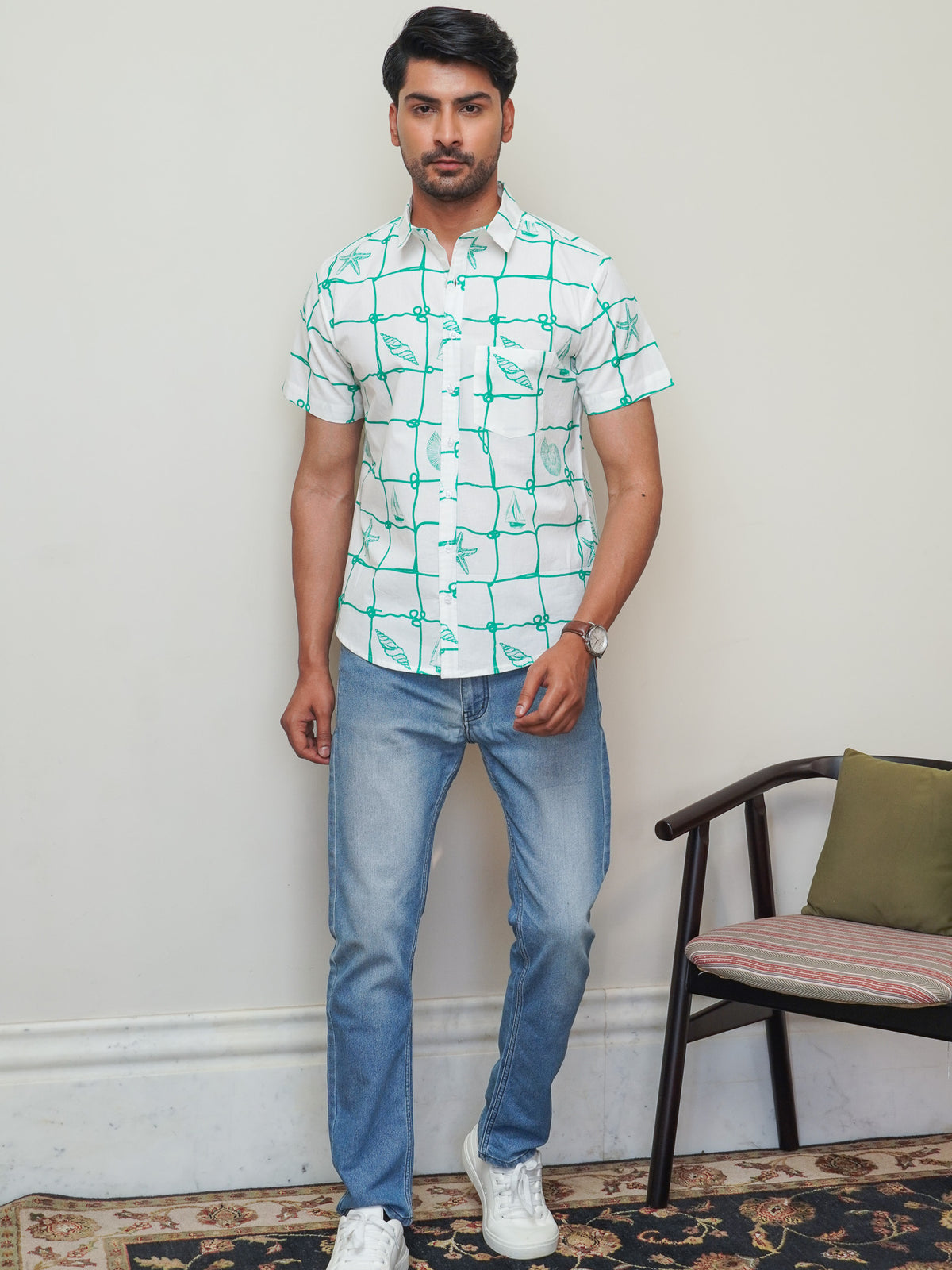 Front view of men’s green box abstract printed cotton shirt