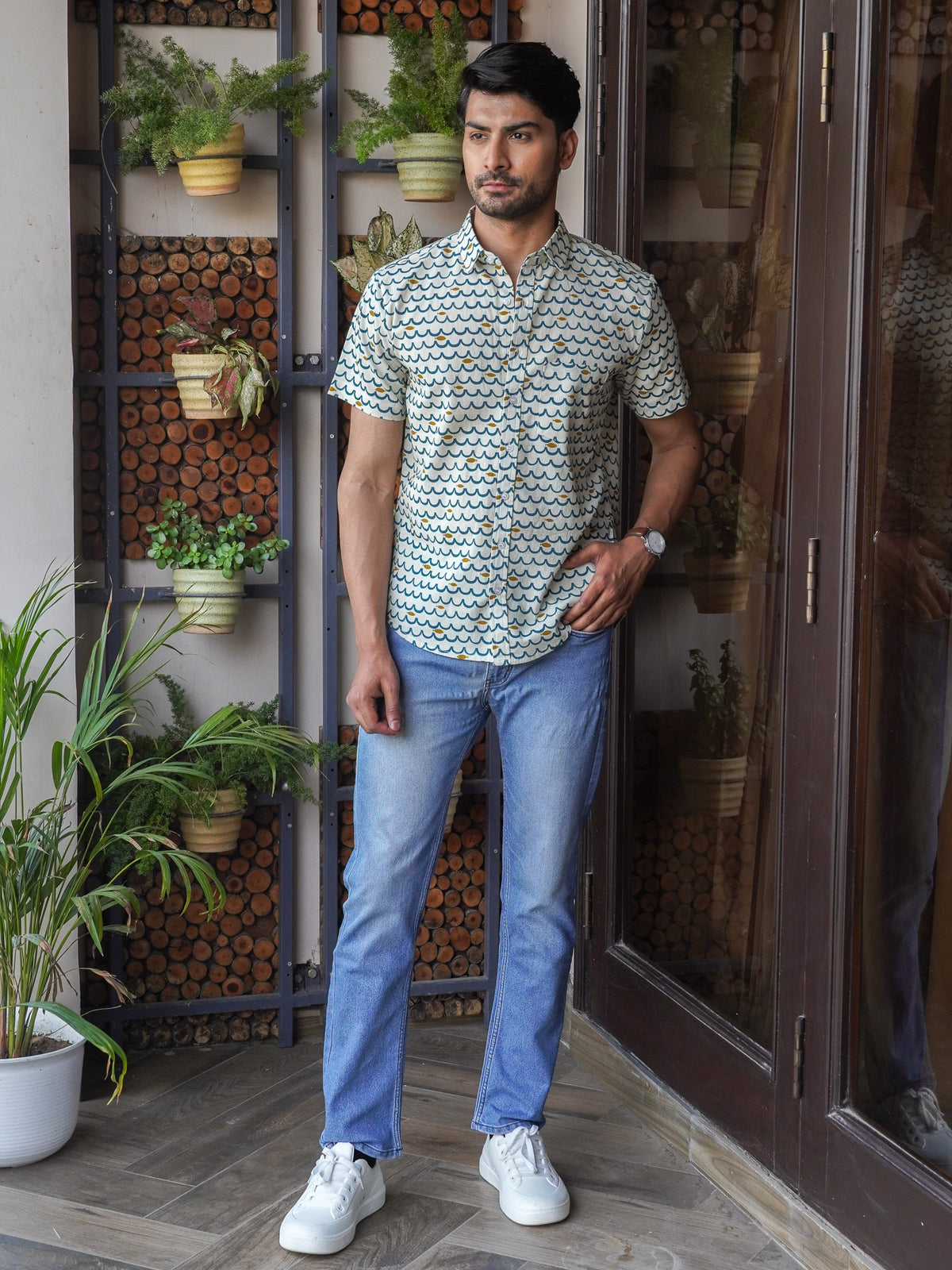 Front view of men’s green floral printed cotton shirt