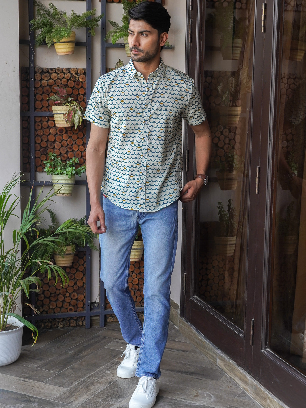 Front view of men’s green floral printed cotton shirt