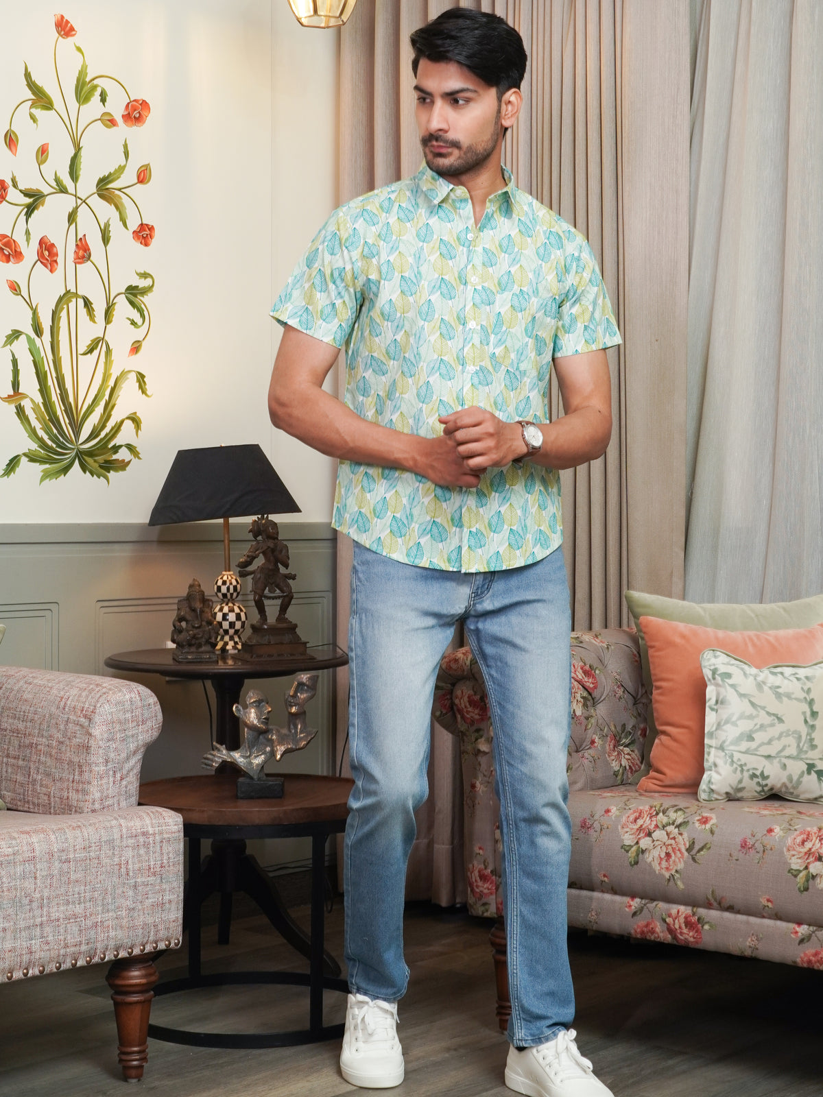 Front view of men’s green leaf printed cotton shirt