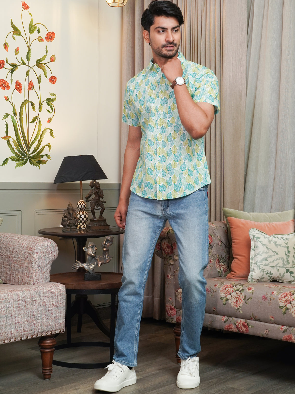 Front view of men’s green leaf printed cotton shirt