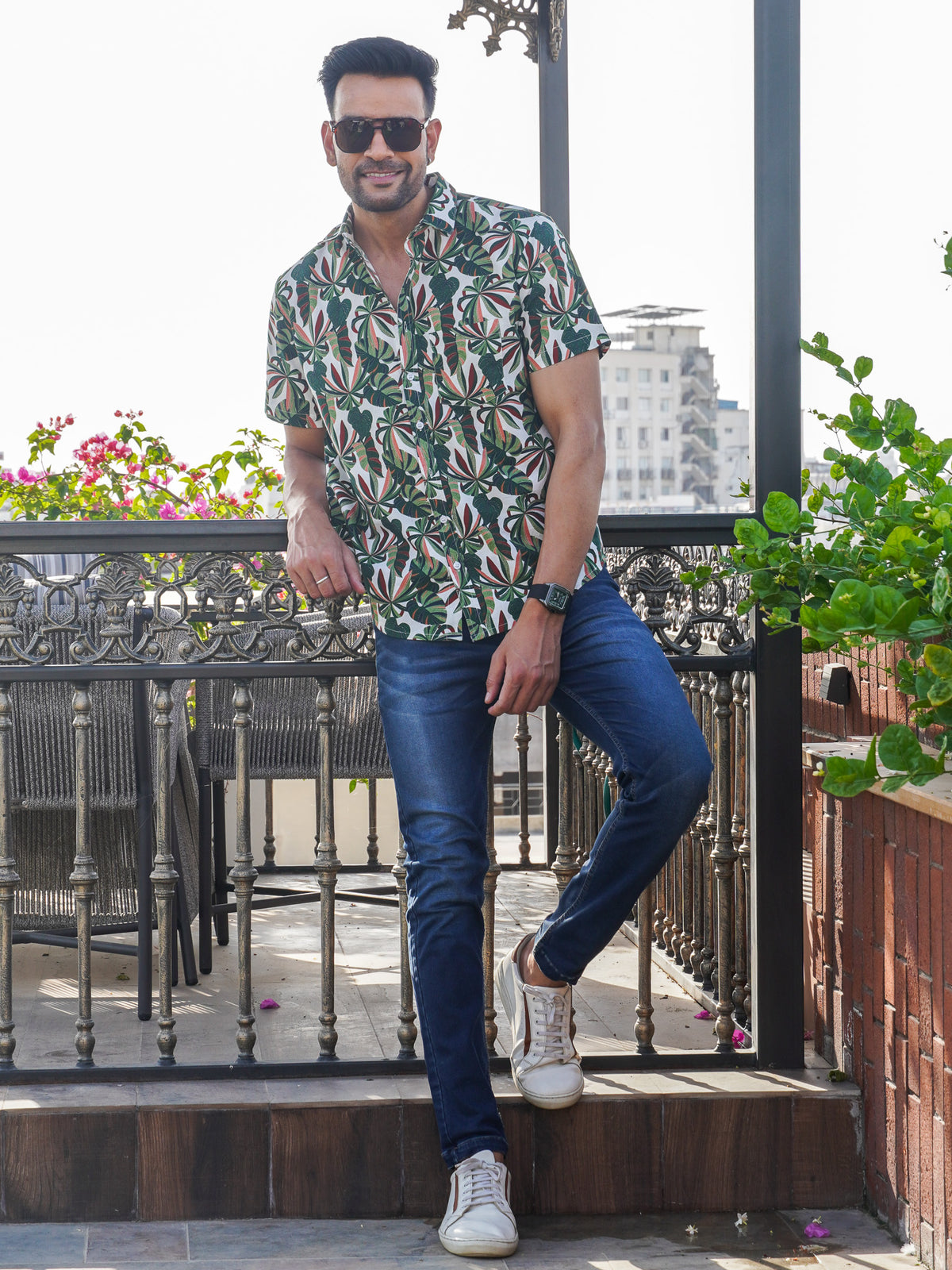 Front view of men’s green leaf printed cotton shirt