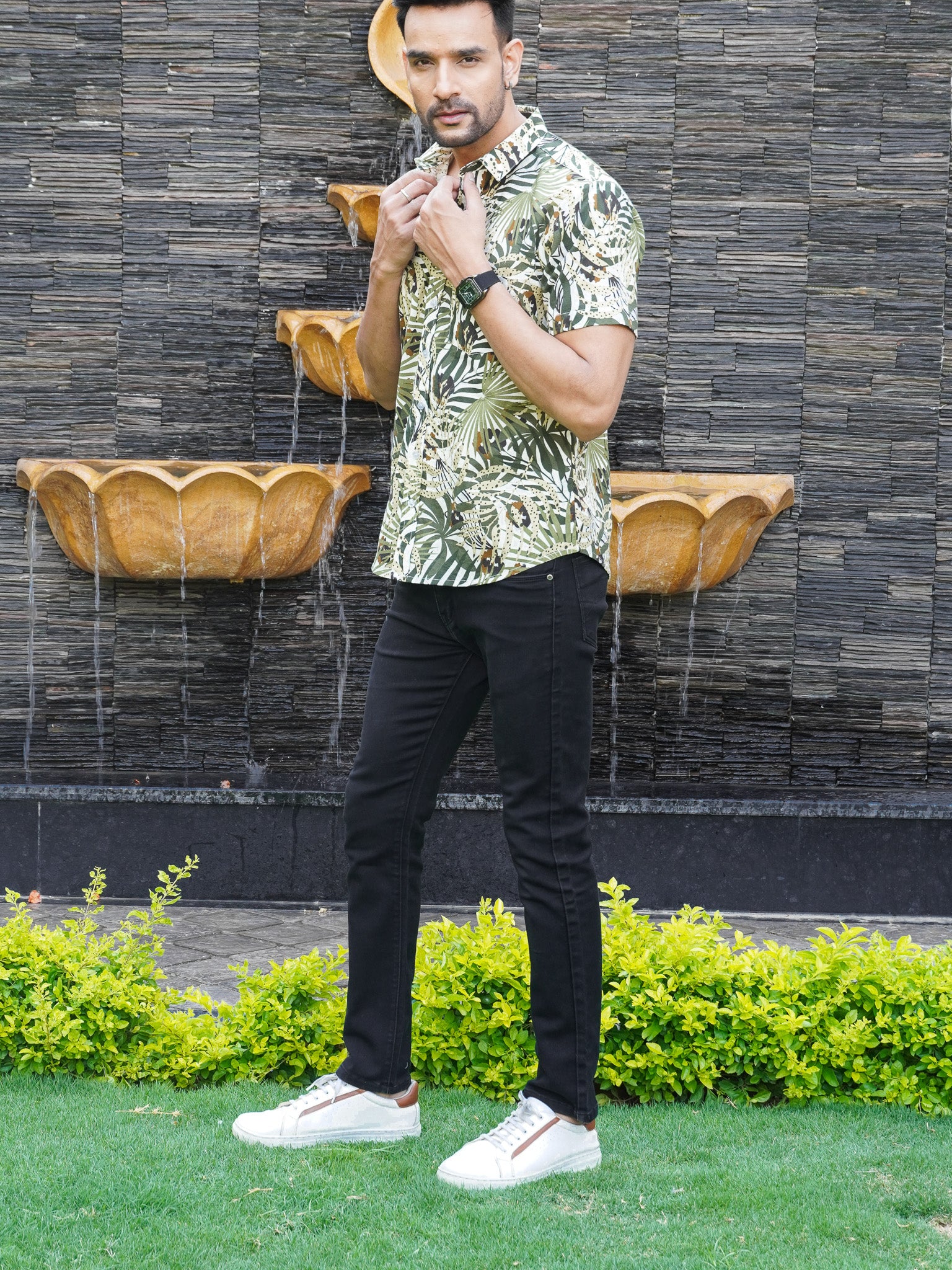 Side view of green botanical print half sleeve shirt for men