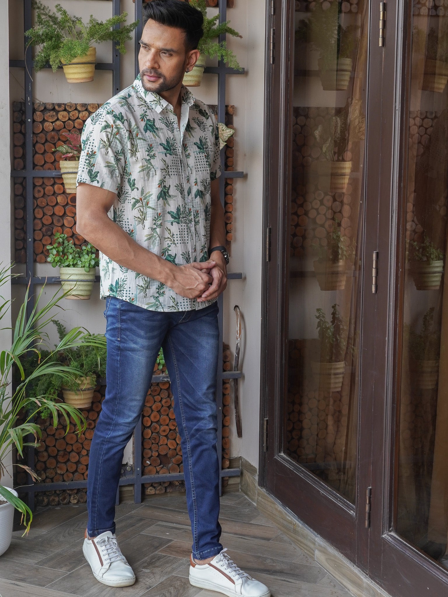 Side view of light green botanical lattice print shirt for men