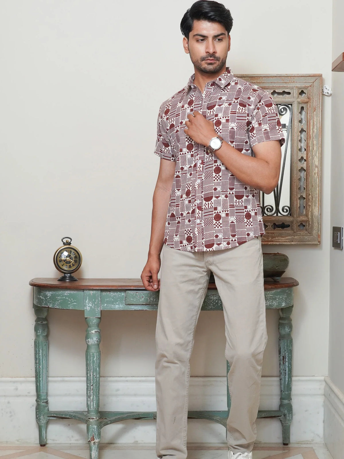 Model wearing a maroon and white geometric printed cotton shirt