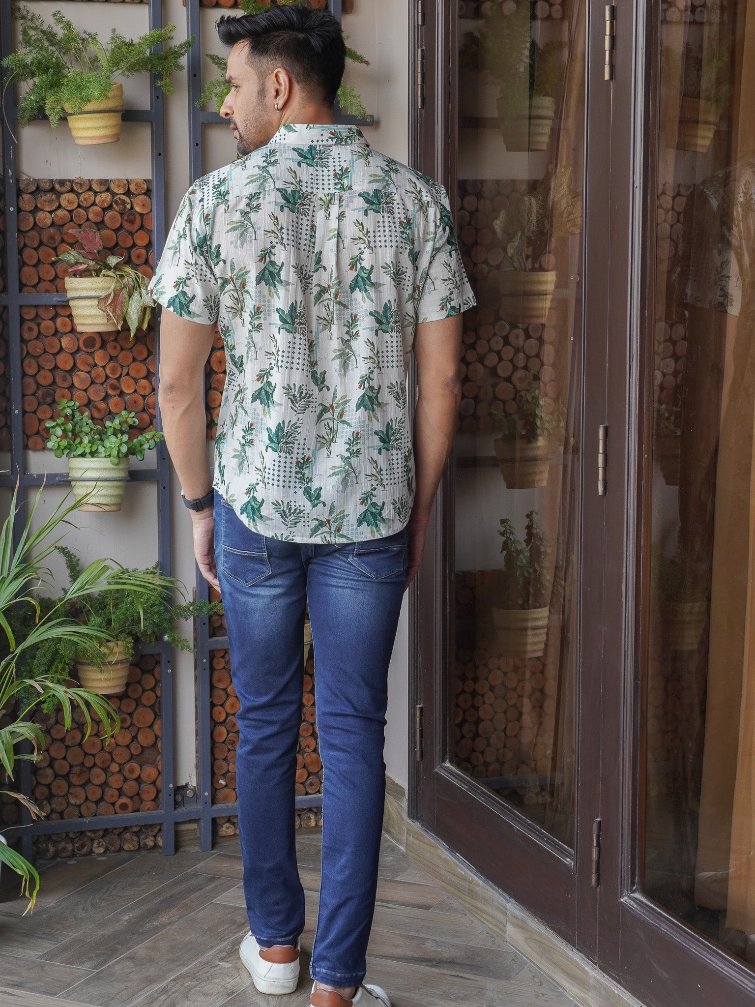 Back view of men’s light green leaf and lattice print regular fit shirt