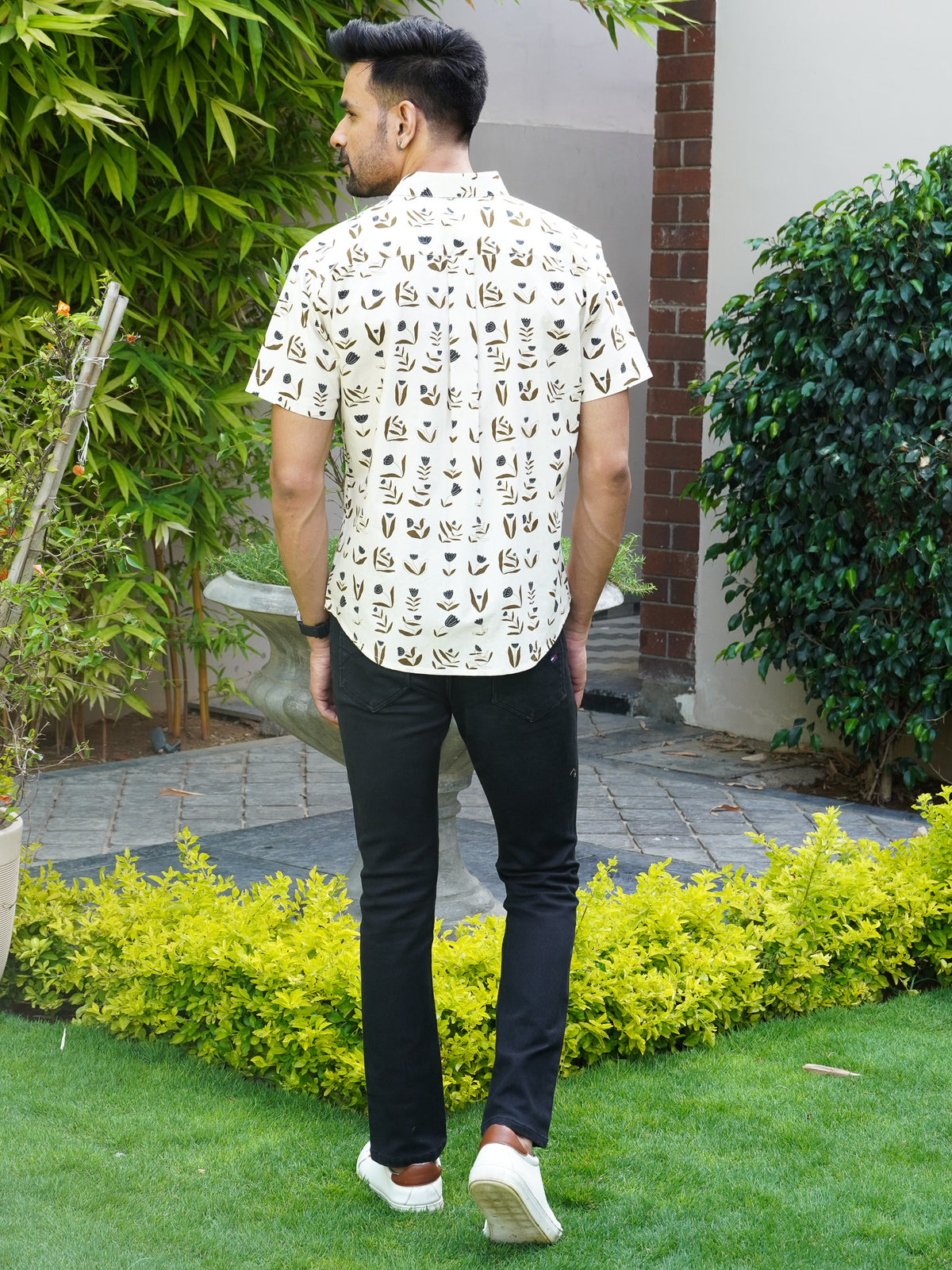 Back view of The Dapper X beige floral printed shirt