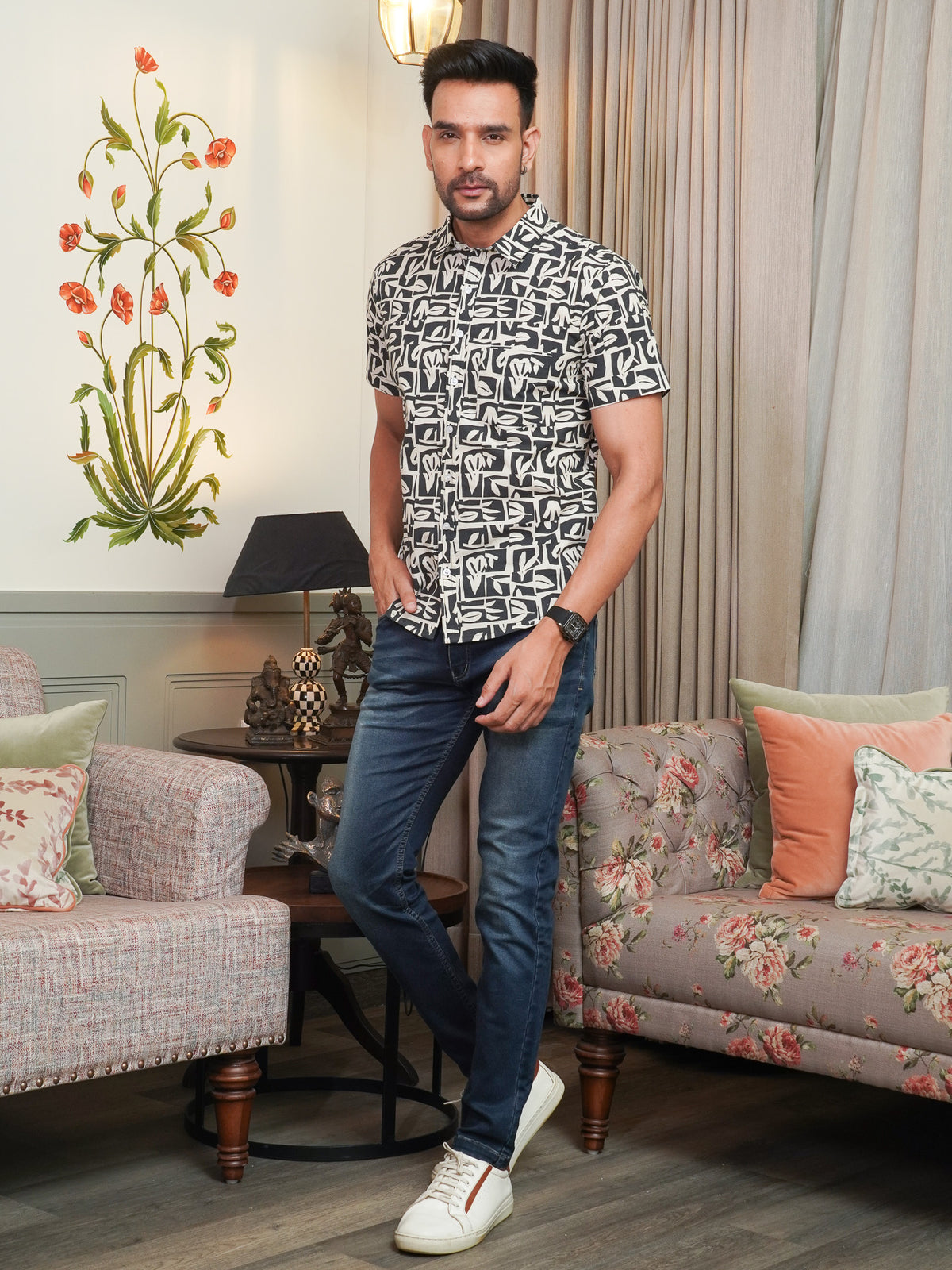 Side view of men’s black geometric half sleeve shirt