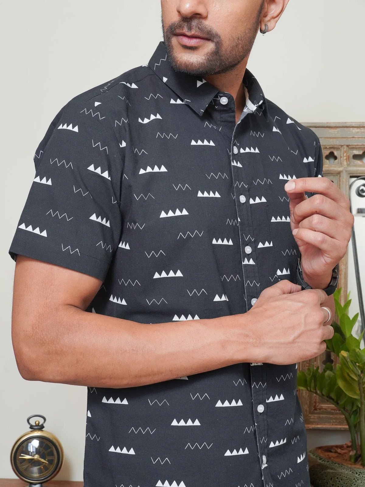 Side view of men’s black half sleeve printed shirt