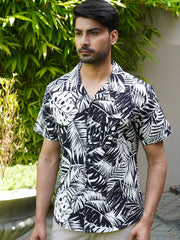 Side view of black and white botanical leaf half sleeve shirt for men