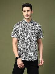Model wearing a black and white abstract typography printed cotton shirt
