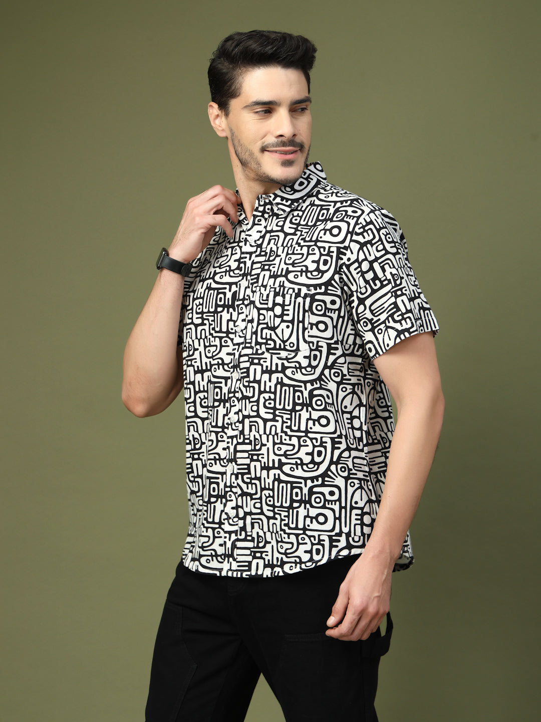 Model wearing a black and white abstract typography printed cotton shirt