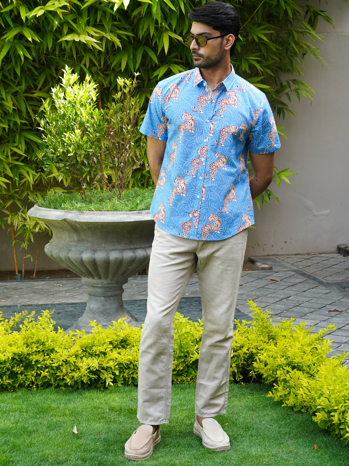 Side view of men’s leopard printed half sleeve shirt