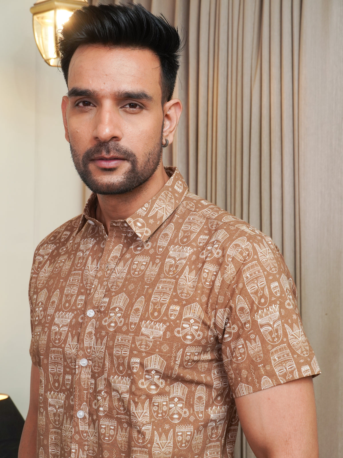 Side view of men’s brown printed half sleeve shirt