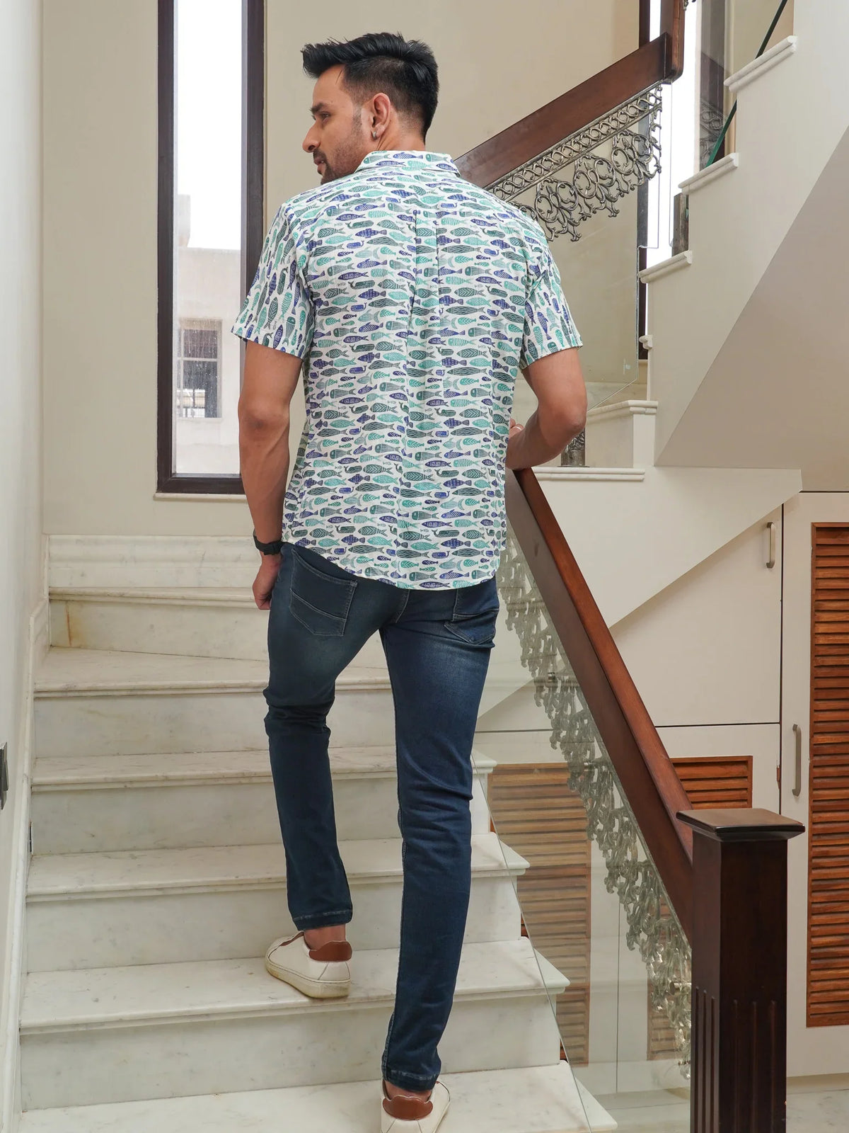 Back view of The Dapper X green fish printed shirt