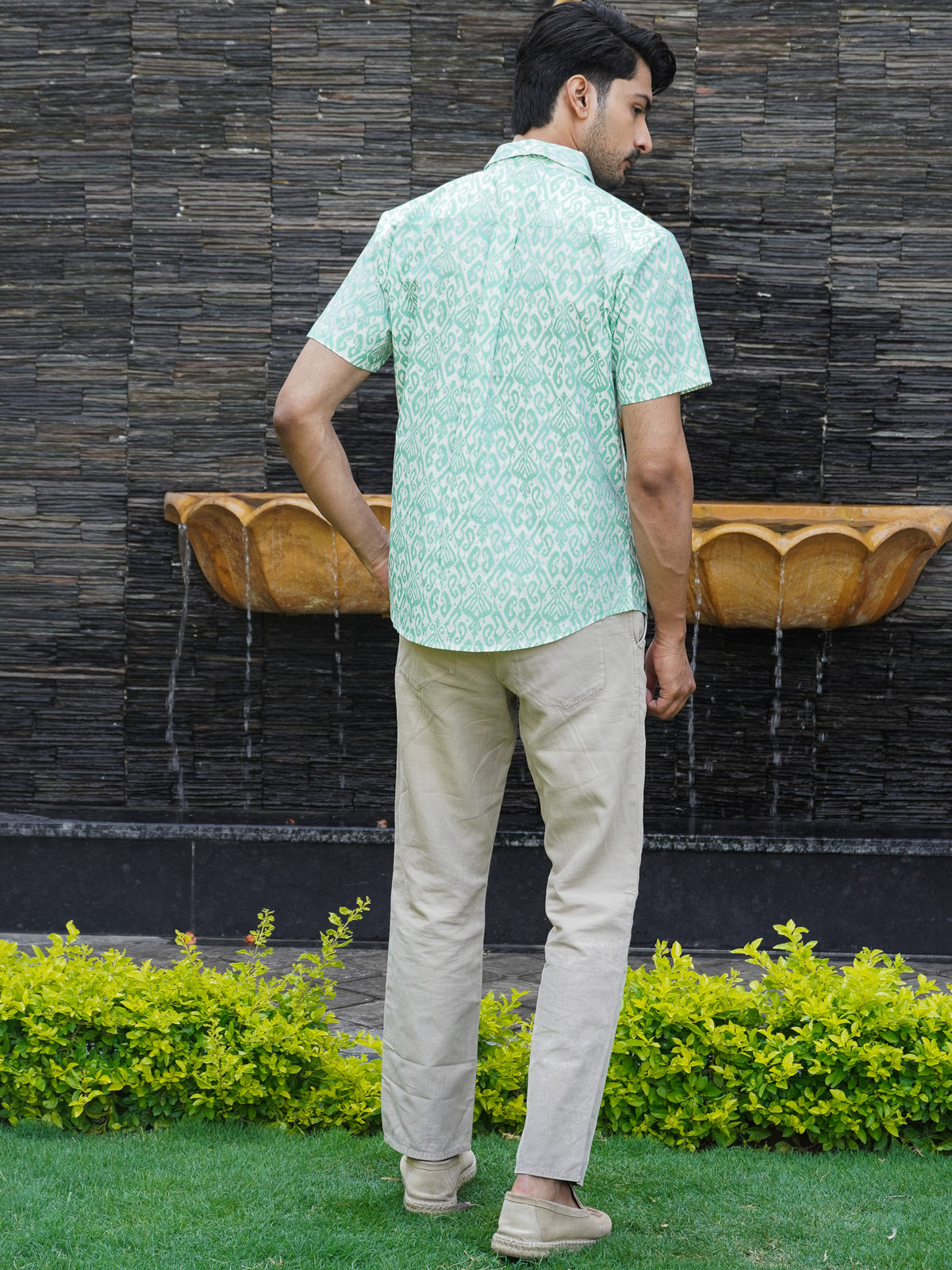 Back view of The Dapper X green geometric printed shirt