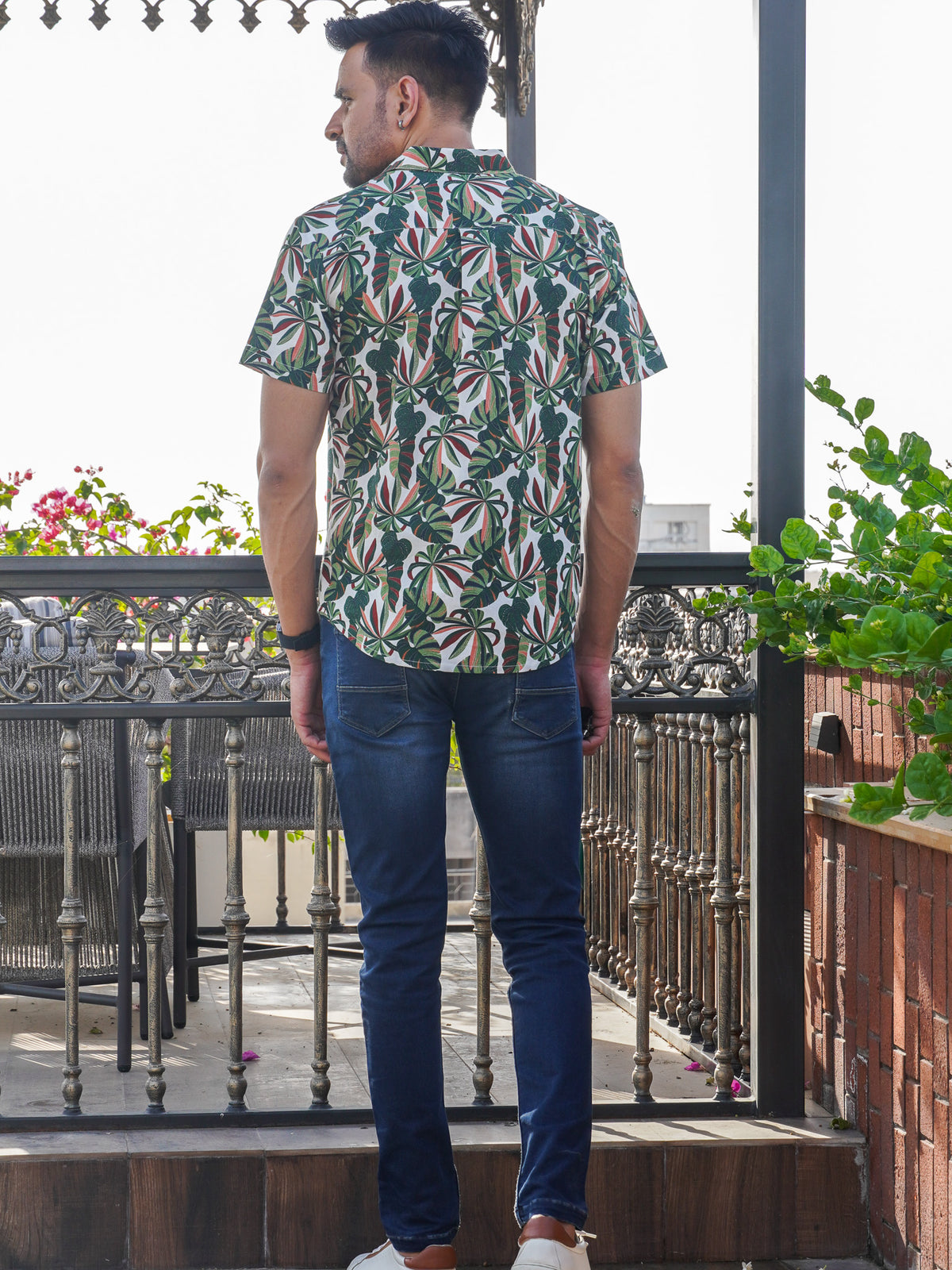 Back view of The Dapper X green tropical leaf shirt