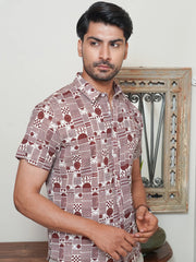 Model wearing a maroon and white geometric printed cotton shirt