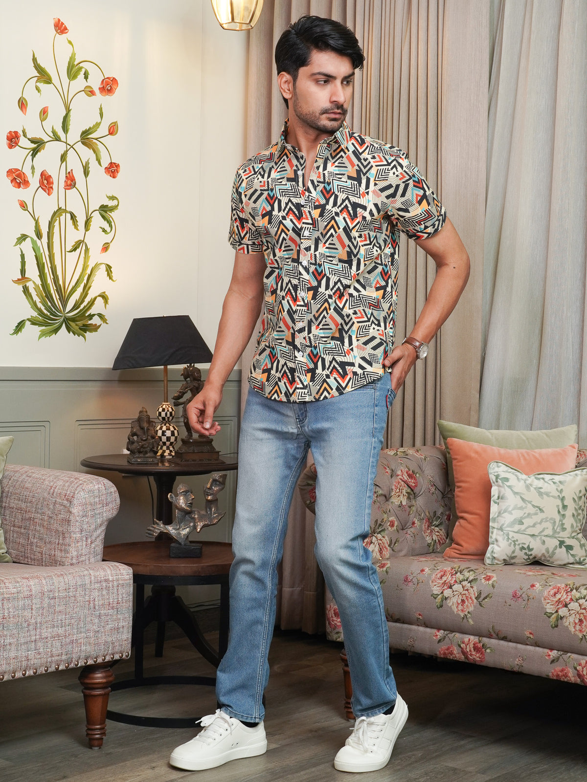 Model wearing a multicolor artistic geometric printed cotton shirt