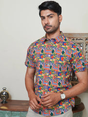 Model wearing a multicolor geometric printed cotton half sleeve shirt