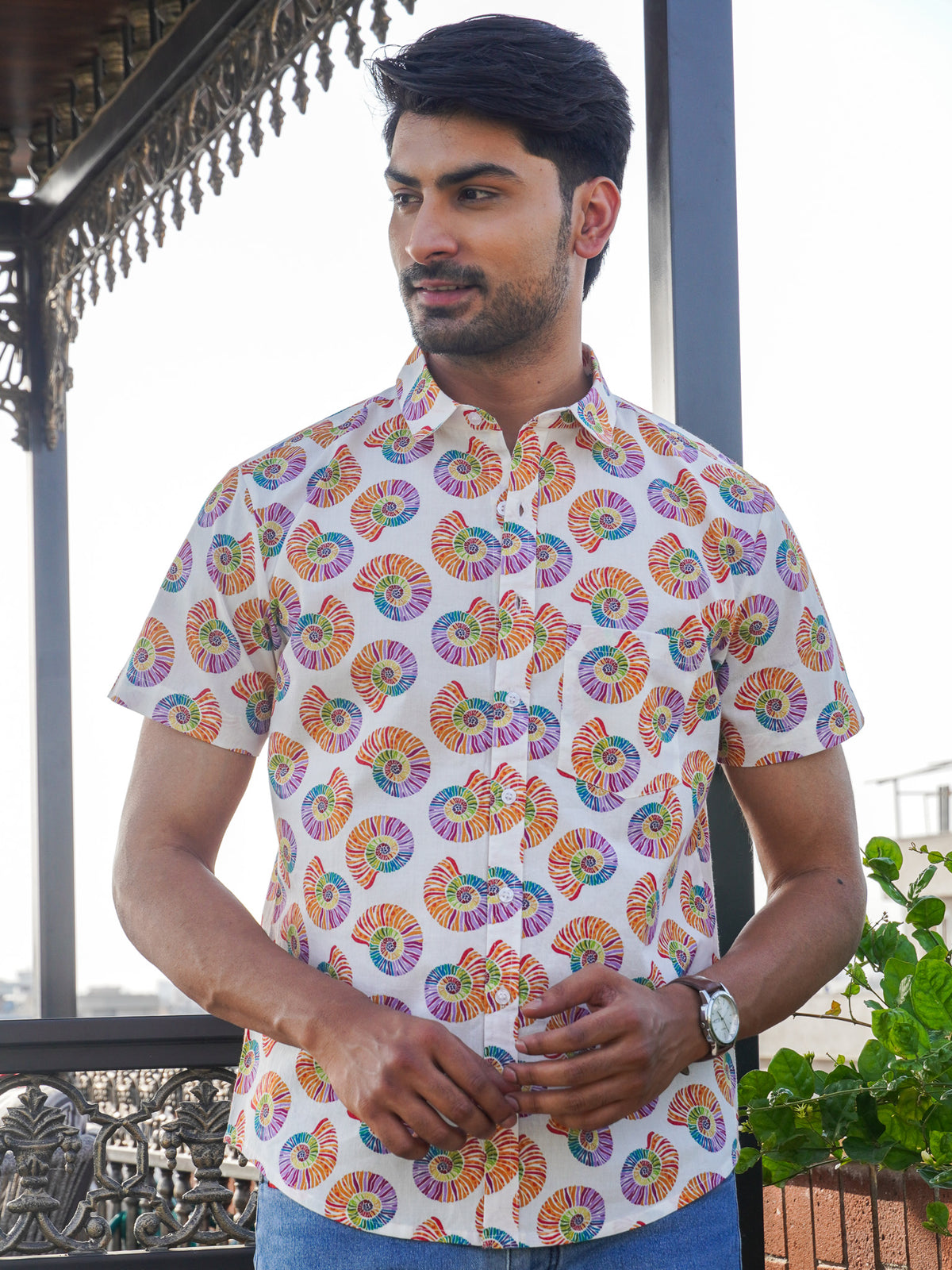 Model wearing a multicolor shell pattern printed cotton shirt