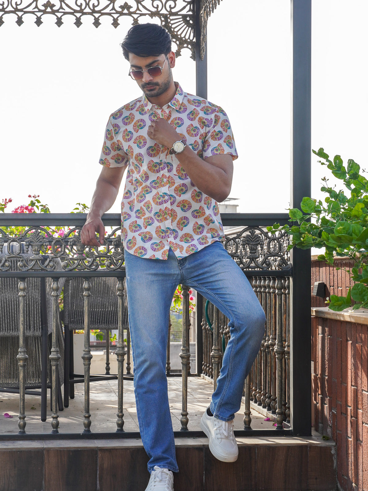 Model wearing a multicolor shell pattern printed cotton shirt