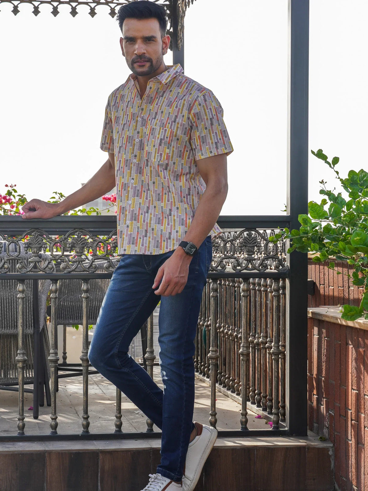 Model wearing a Multiplaid multicolor printed cotton half sleeve shirt