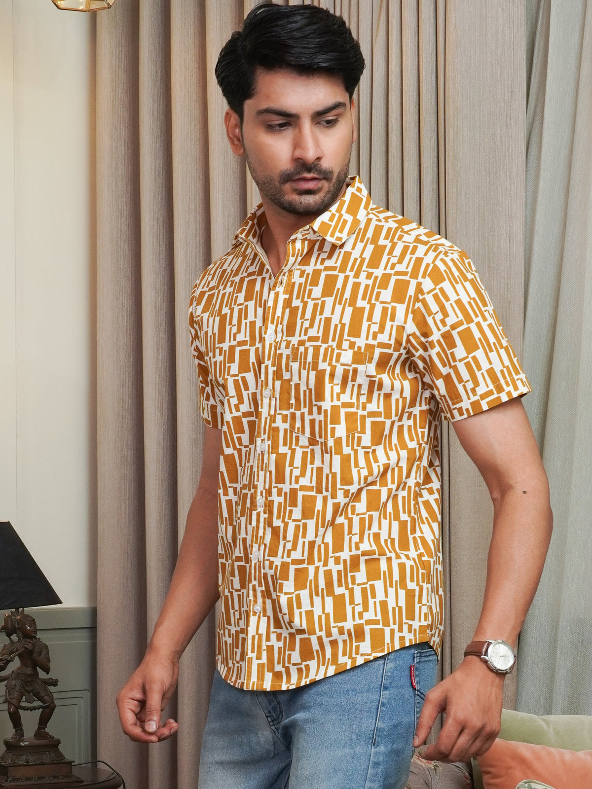 Side view of men’s mustard half sleeve printed shirt