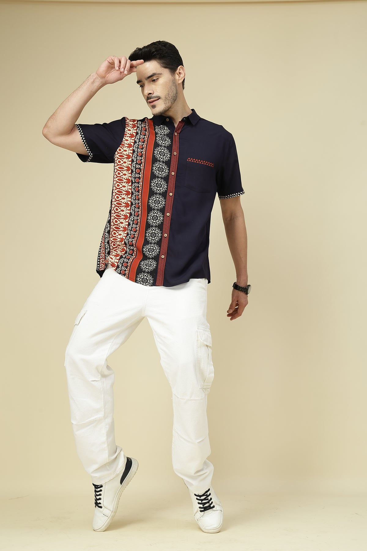 Blue chest pocket with a small red motif accent above it