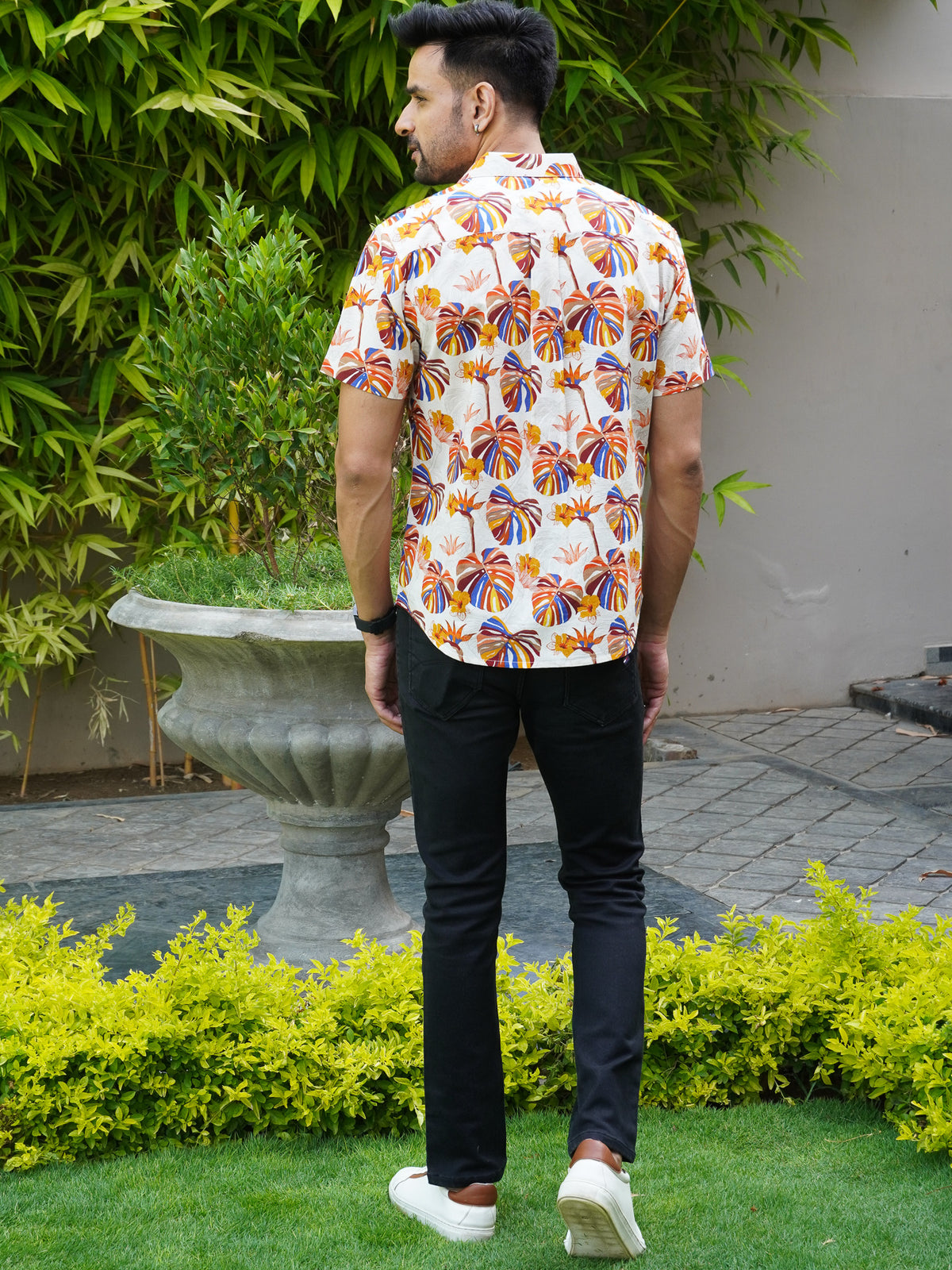 Back view of The Dapper X tropical leaf printed shirt