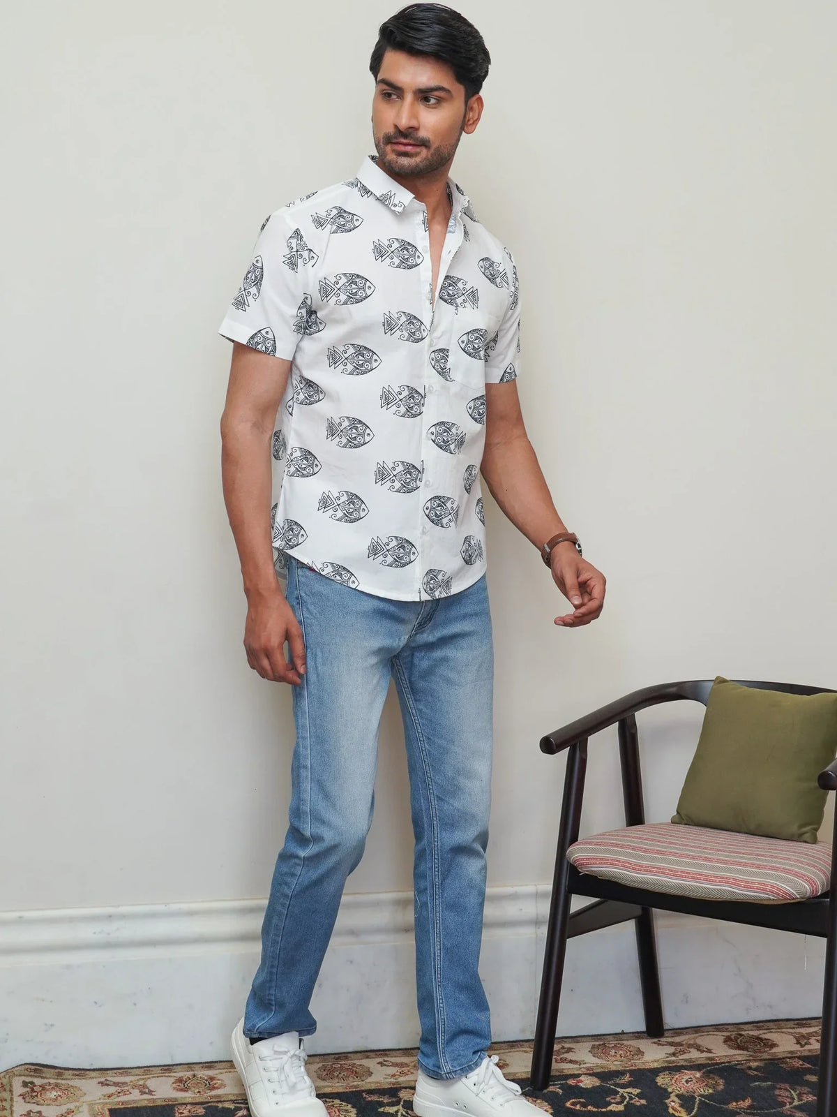 Side view of men’s black fish print half sleeve shirt