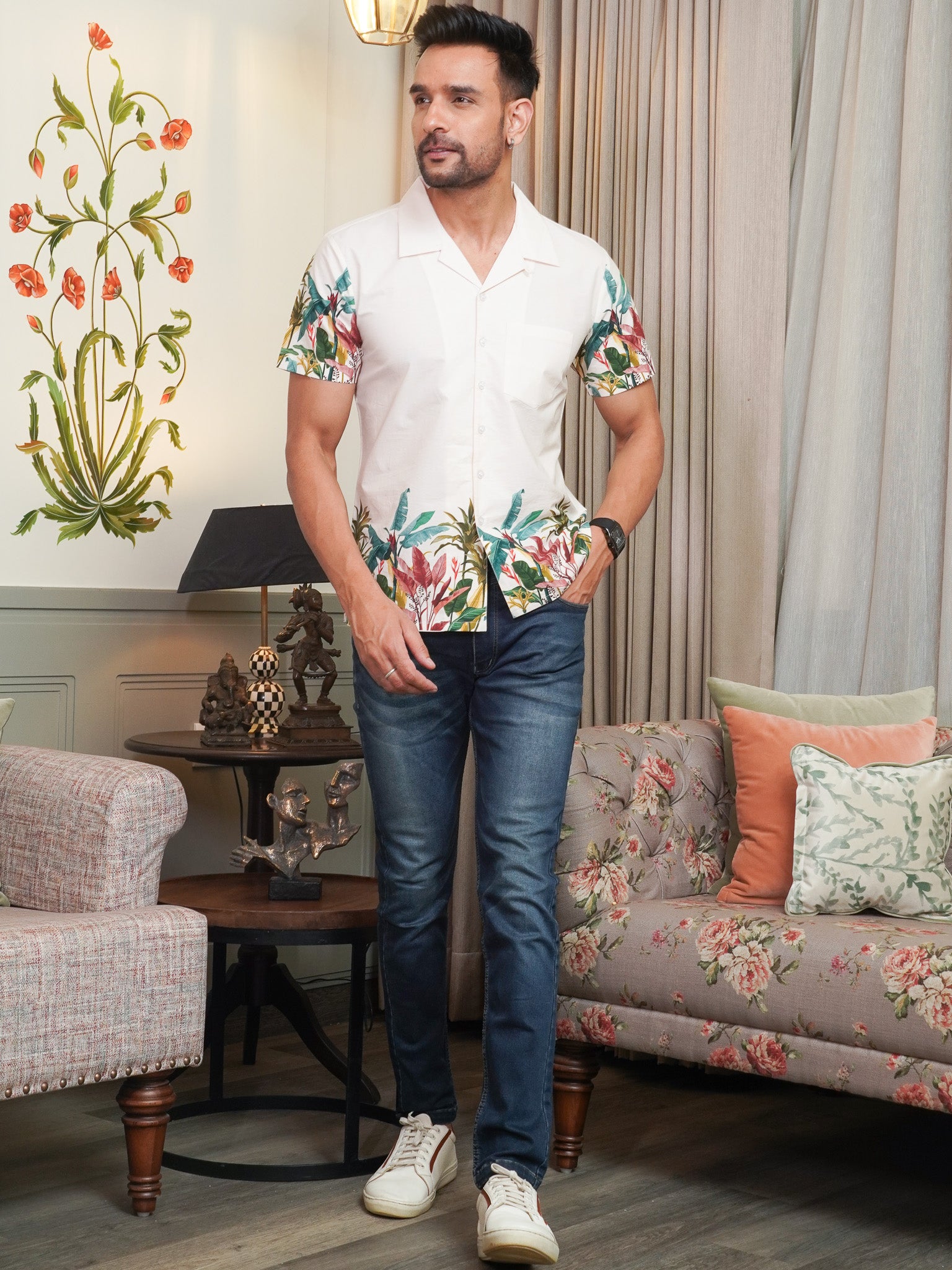 Model wearing white tropical print half sleeve shirt for men