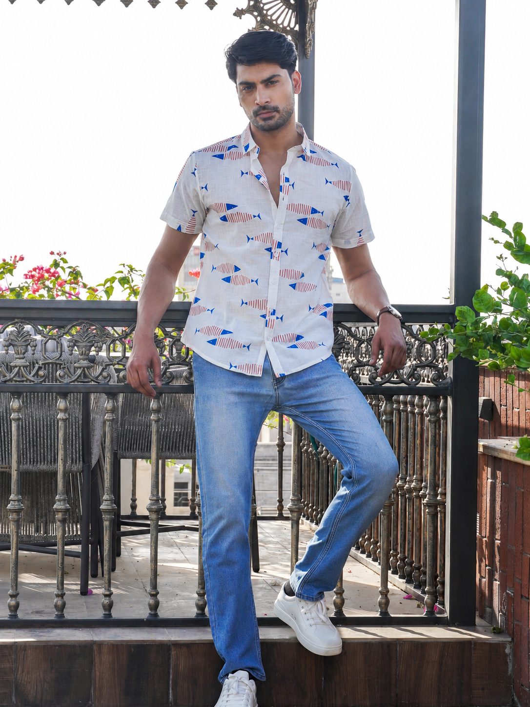 Collar and half sleeve detail of men’s white cotton printed shirt