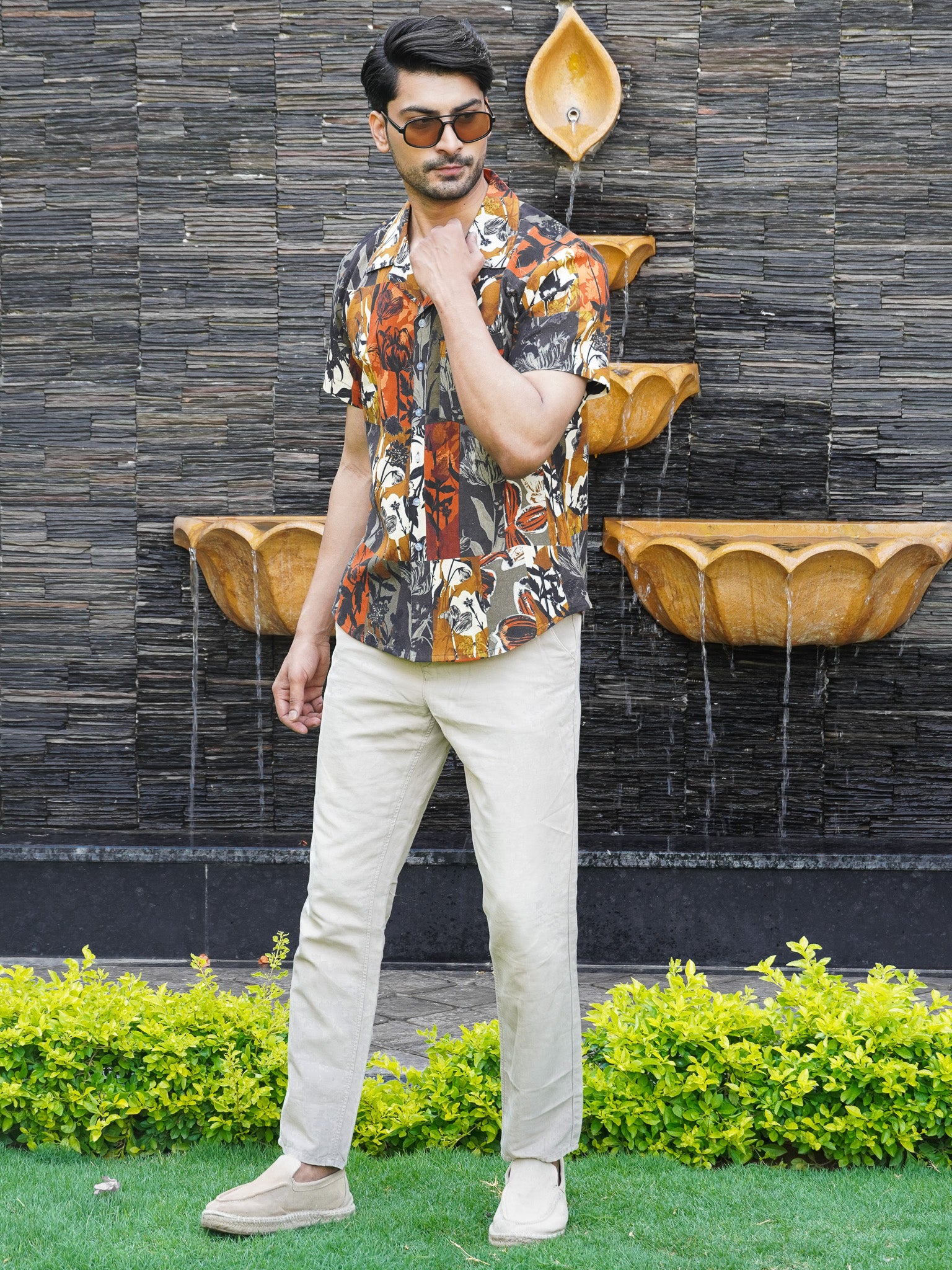 Model wearing men’s multicolour floral print cotton shirt with half sleeves
