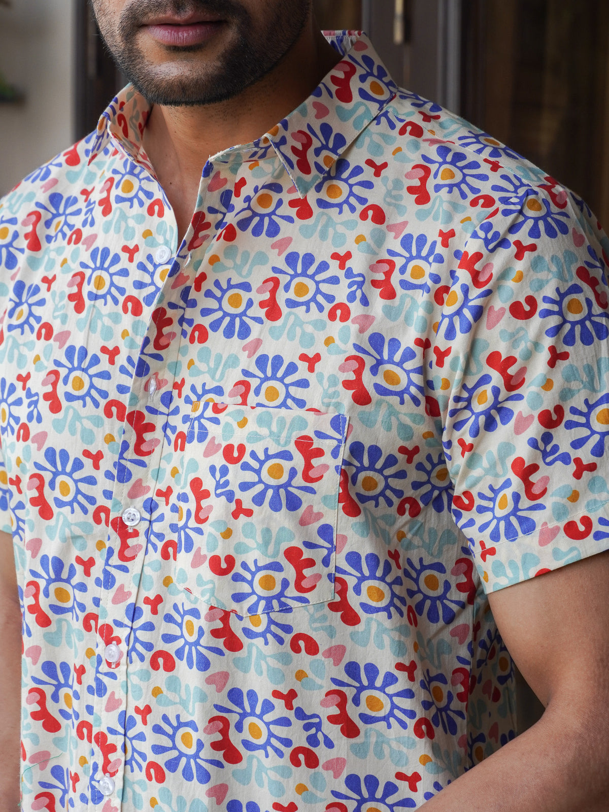 Close-up of blue orange red and yellow floral abstract motifs