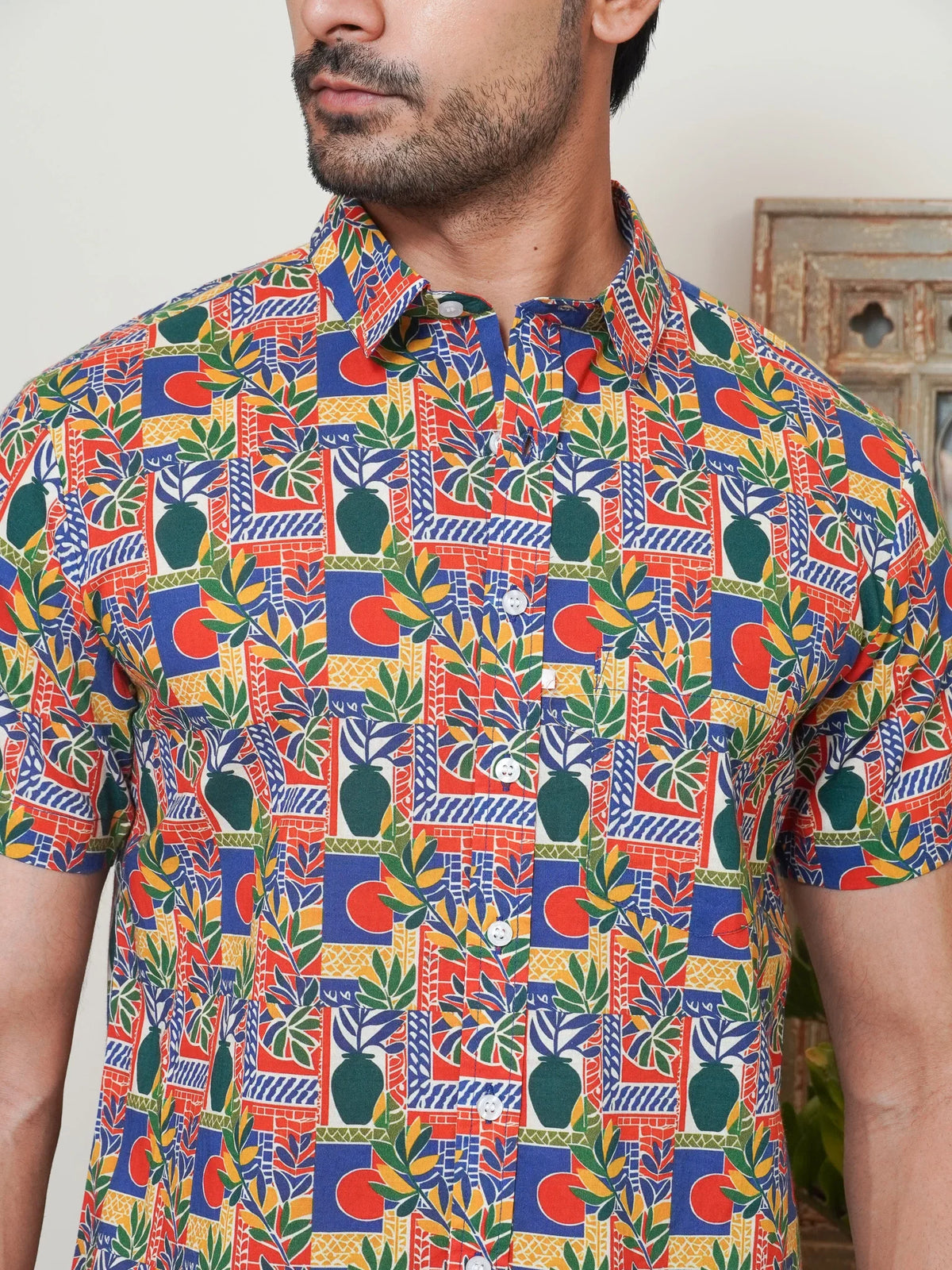 Close-up of orange red green and blue geometric motifs