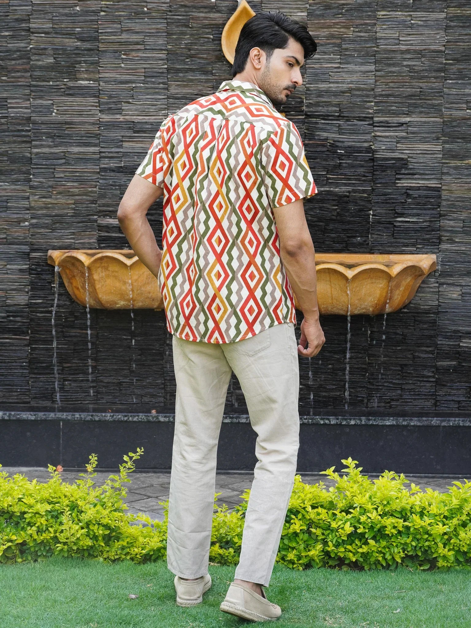 Back view of men’s white multicolour abstract print regular fit shirt
