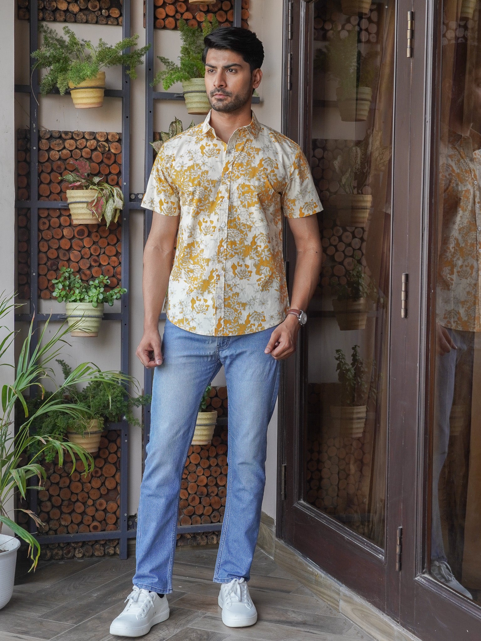Regular collar detail on men’s mustard floral printed shirt