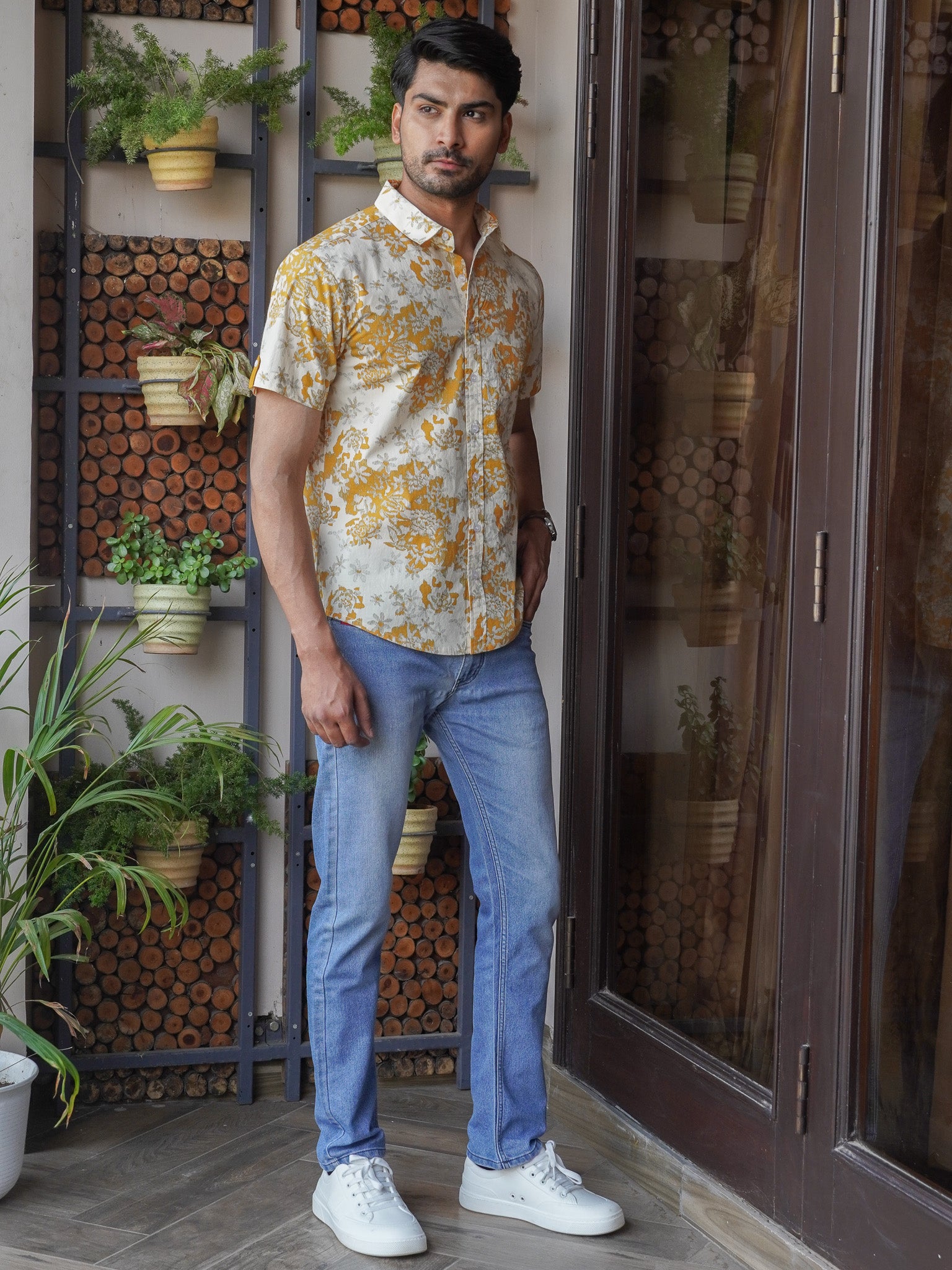 Regular collar detail on men’s mustard floral printed shirt
