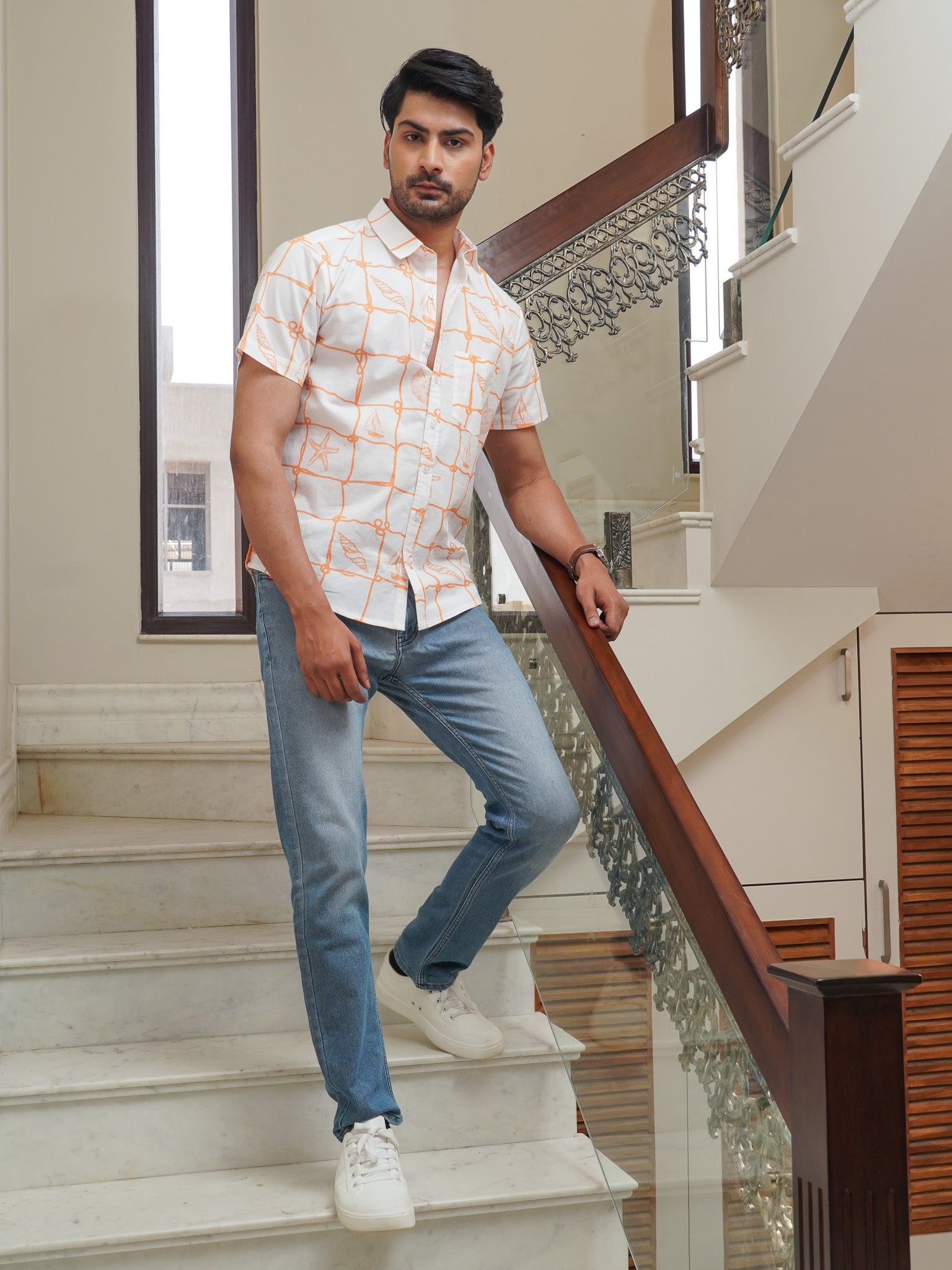 Regular collar detail on men’s white orange printed shirt