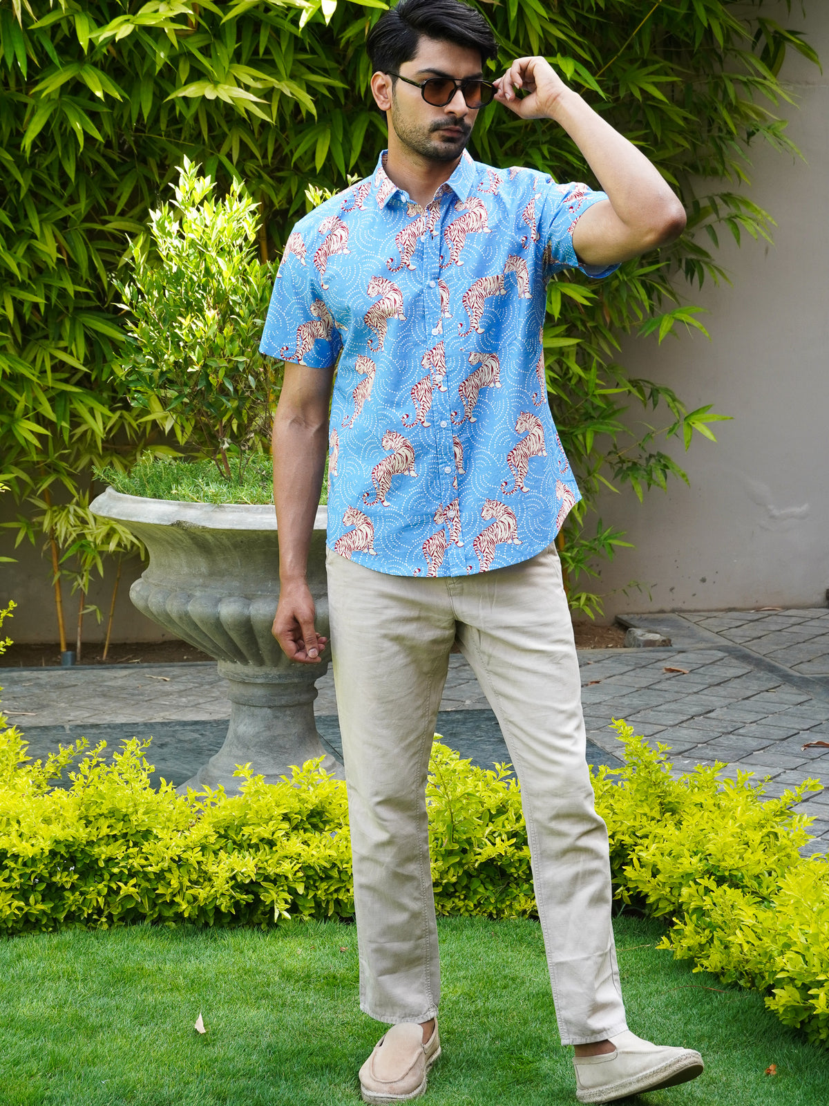 Front view of men’s sky blue leopard printed cotton shirt