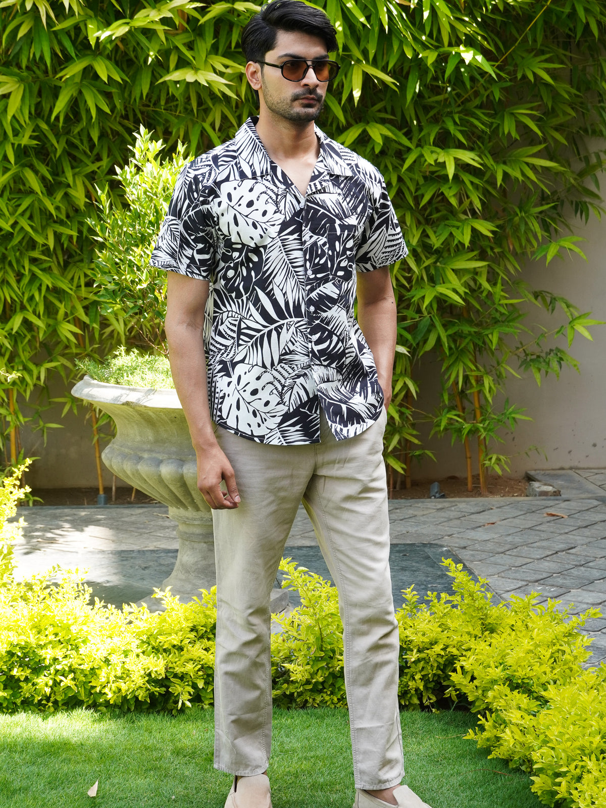 Relaxed collar detail on men’s black and white tropical printed shirt